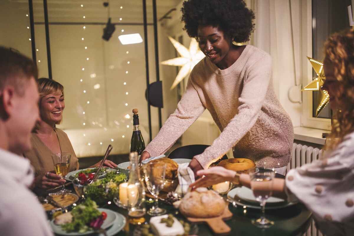 Friends celebrate the holidays with a healthy meal to relieve bloating