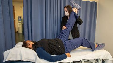 Physical Therapist Elena Perrier working with a patient